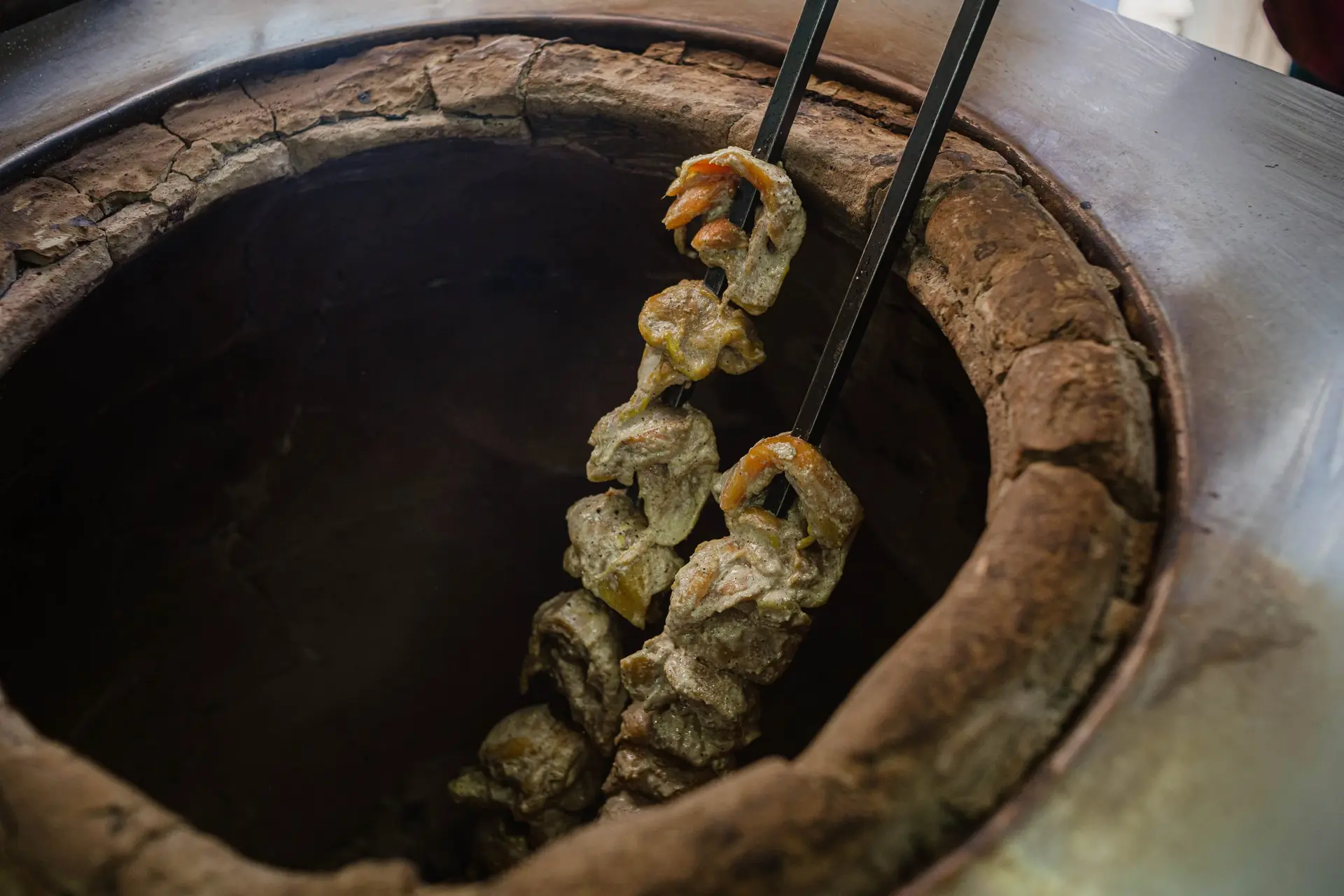 Tandoor oven fire at extreme temperature